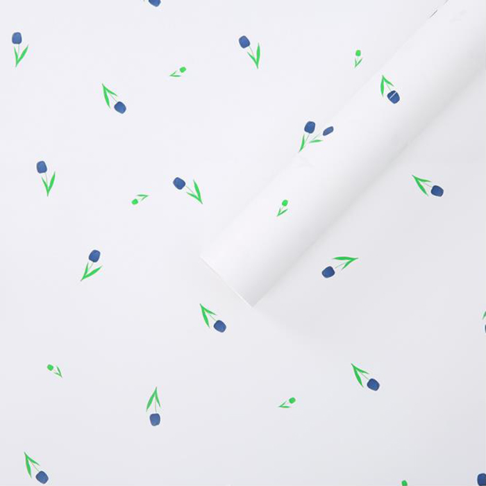 Boeket dik inpakpapier met artistieke woorden