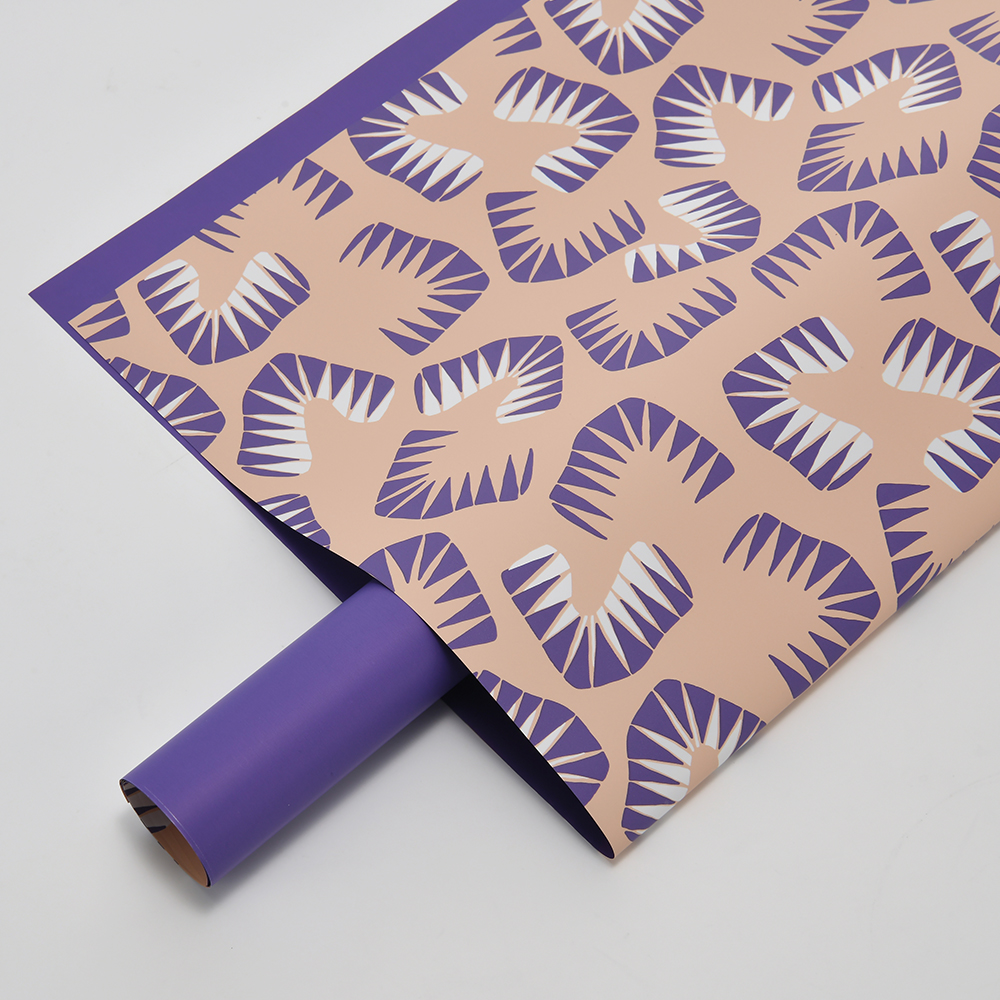 Zes felgekleurd bloemeninpakpapier met bladmotief