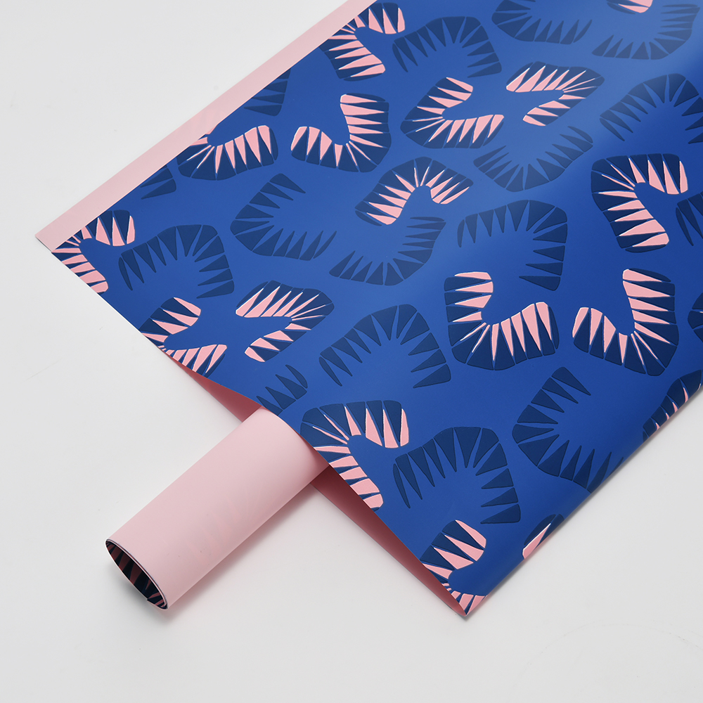 Zes felgekleurd bloemeninpakpapier met bladmotief
